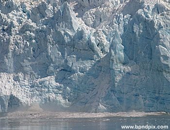 Calving ice falls from the Hubbard Glacier in Yakutat bay, Alaska