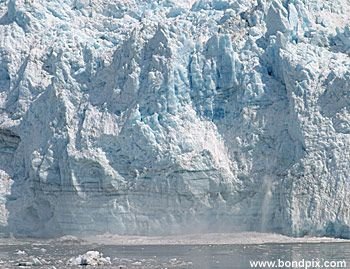 Calving ice falls from the Hubbard Glacier in Yakutat bay, Alaska