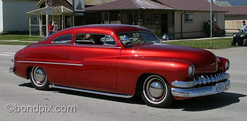 Deer-Lodge-Parade_14713.jpg - Classic vehicles, vintage and muscle cars and tractors drive along Main Street during the Territorial Days Parade in Deer Lodge Montana, June 14th 2008