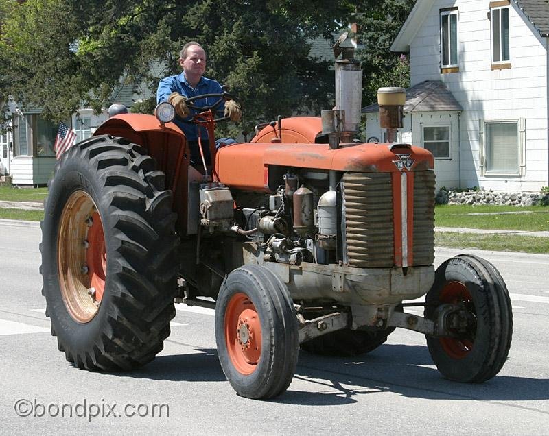 Deer-Lodge-Parade_14777.jpg - Vintage tractors drive along Main Street during the Territorial Days Parade in Deer Lodge Montana, June 14th 2008