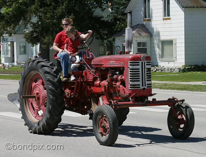 Deer-Lodge-Parade_14780.jpg - Vintage tractors drive along Main Street during the Territorial Days Parade in Deer Lodge Montana, June 14th 2008