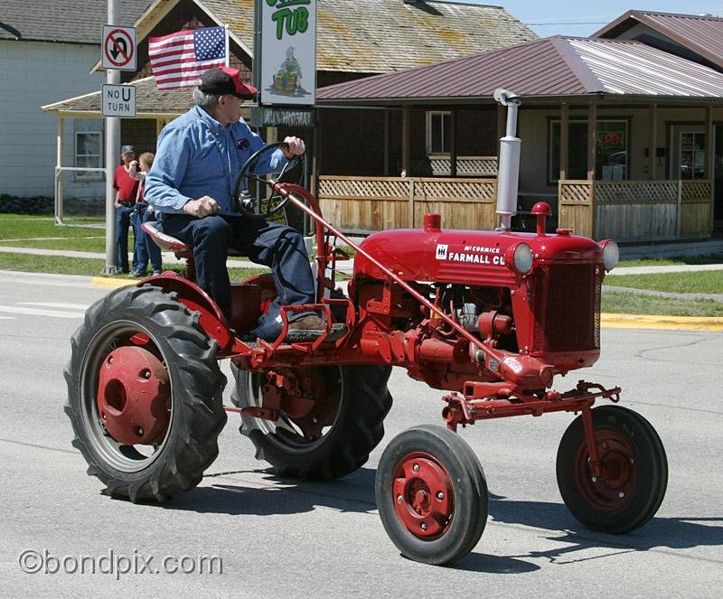 Deer-Lodge-Parade_14783.jpg - Vintage tractors drive along Main Street during the Territorial Days Parade in Deer Lodge Montana, June 14th 2008