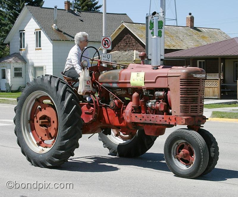 Deer-Lodge-Parade_14788.jpg - Vintage tractors drive along Main Street during the Territorial Days Parade in Deer Lodge Montana, June 14th 2008