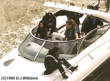 On location with the action unit for the James Bond 007 film 'The World is not Enough'. An exciting boat chase filmed on the River Thames in London