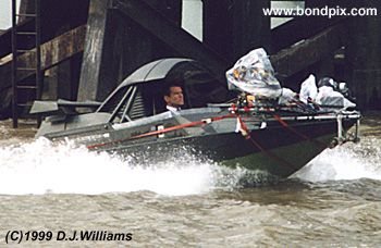 On location with the action unit for the James Bond 007 film 'The World is not Enough'. An exciting boat chase filmed on the River Thames in London