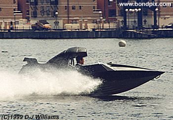 On location with the action unit for the James Bond 007 film 'The World is not Enough'. An exciting boat chase filmed on the River Thames in London