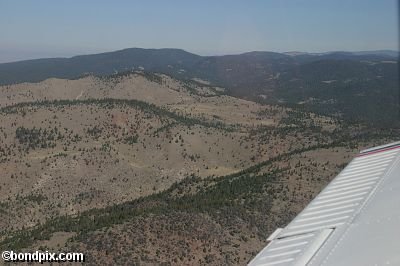 Aerial views over the Deer Lodge valley, Deer Lodge, Anaconda and Butte in Montana