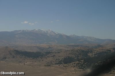 Aerial views over the Deer Lodge valley, Deer Lodge, Anaconda and Butte in Montana