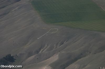 Aerial views over the Deer Lodge valley, Deer Lodge, Anaconda and Butte in Montana