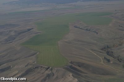 Aerial views over the Deer Lodge valley, Deer Lodge, Anaconda and Butte in Montana