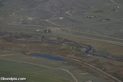 Aerial views over the Deer Lodge valley, Deer Lodge, Anaconda and Butte in Montana