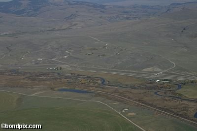 Aerial views over the Deer Lodge valley, Deer Lodge, Anaconda and Butte in Montana