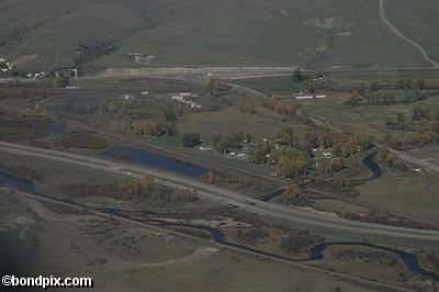 Aerial views over the Deer Lodge valley, Deer Lodge, Anaconda and Butte in Montana