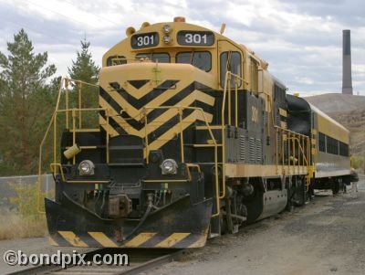 The Copper King Express and smelter stack on RARUS Railway in Anaconda, Montana