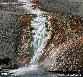 Colorful waterfall in Yellowstone Park