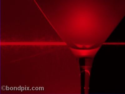 Red Laser Beam shooting through Martini glass