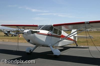 Stinson 108-1 aircraft at the annual fly in at Pogreba Field, Three Forks, Montana