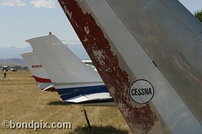 Tail fins line up on aircraft at the annual fly in at Pogreba Field, Three Forks, Montana