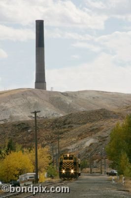 The Copper King Express and smelter stack on RARUS Railway in Anaconda, Montana