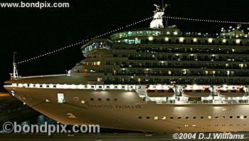 Cruise ship illuminated at night