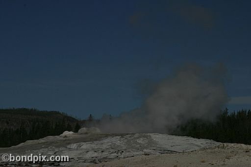 Old Faithful geyser errupts in Yellowstone Park