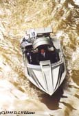 Stuntman Wade Eastwood in James Bonds Q boat on the River Thames in London