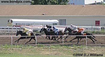 Jockeys Carl Hebert, Roger Butterfly and Terrance Birdrattler